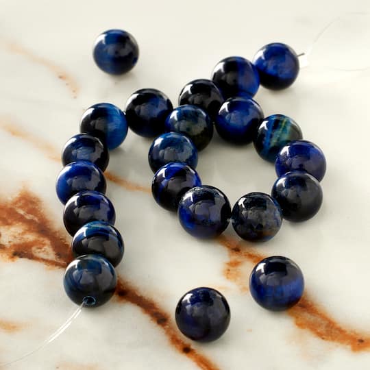12 Packs: 22 ct. (264 total) Dark Blue Tiger Eye Round Beads, 8mm by Bead Landing™